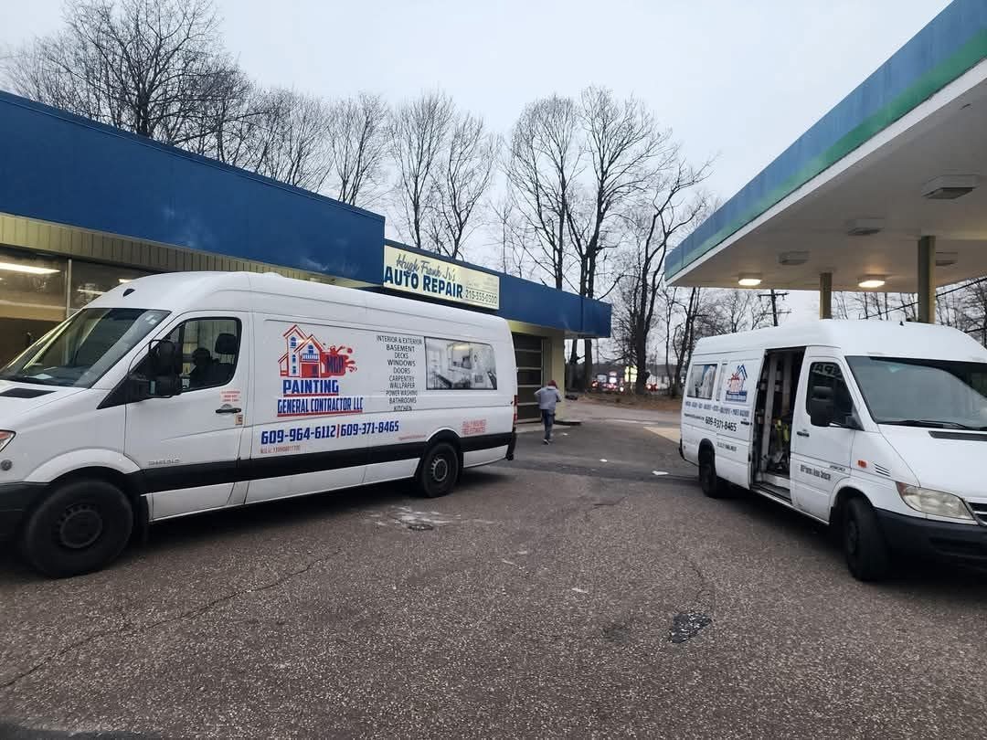 MGP Painting LLC service vans on a commercial job site in New Jersey